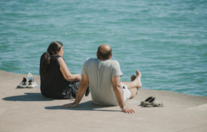 A family relaxing near Lake Michigan during summer.